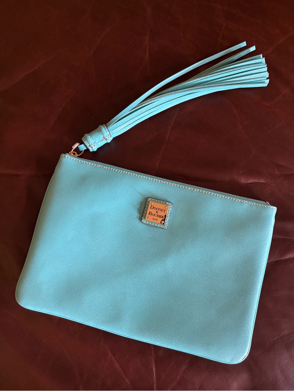 Dooney & Bourke Aqua Leather Wristlet Clutch with Tassel